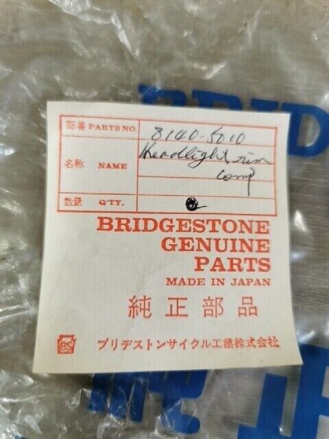 NOS BRIDGESTONE 90 BRIDGESTONE 100 Headlight Rim  8140-5010 B1
