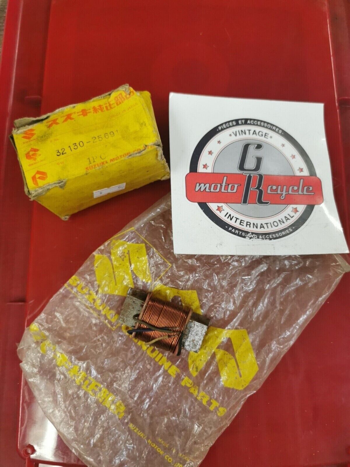 NOS SUZUKI TC100 COIL  LIGHTING A  32130-25691 S23