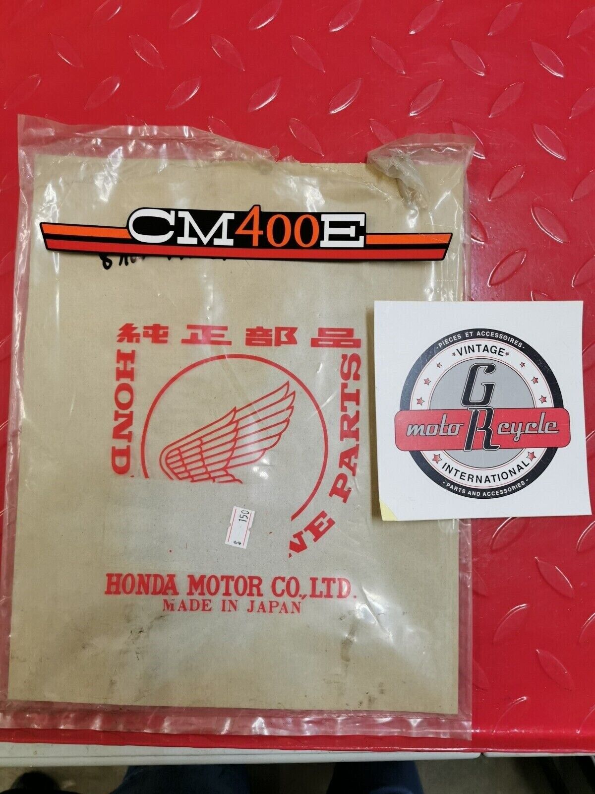 NOS Honda 1980 CM400E EMBLEM, SIDE COVER (A.M.) 87125-447-670 H10