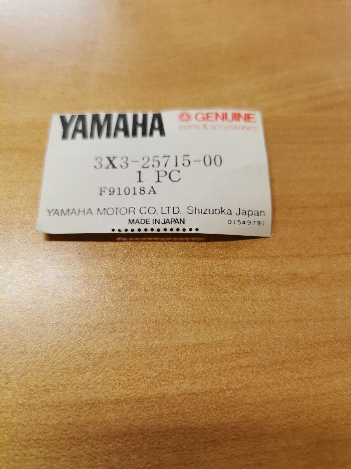 NOS YAMAHA YT125 1980 - 1982 REAR BRAKE CALIPER COVER 3X3-25715-00 Y42