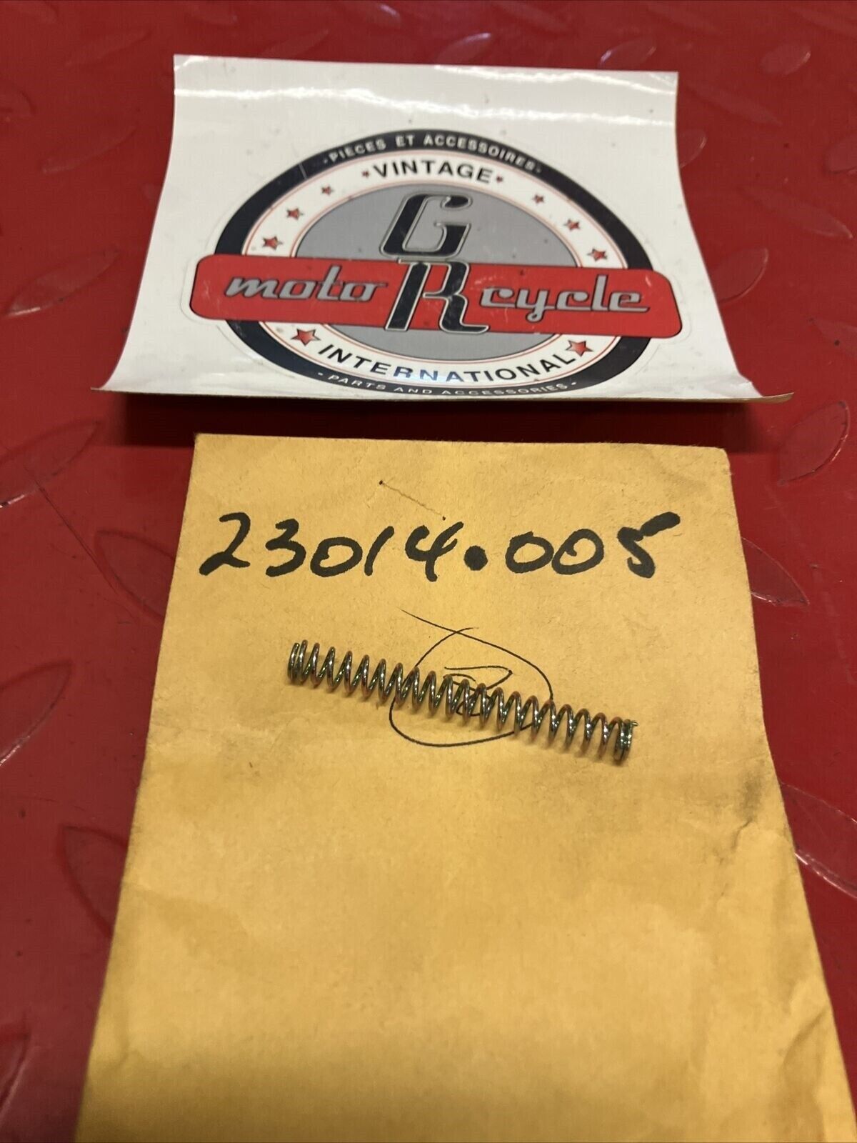 NOS KAWASAKI HEADLIGHT FOCUS ADJUSTER SPRING 23014-005 K20