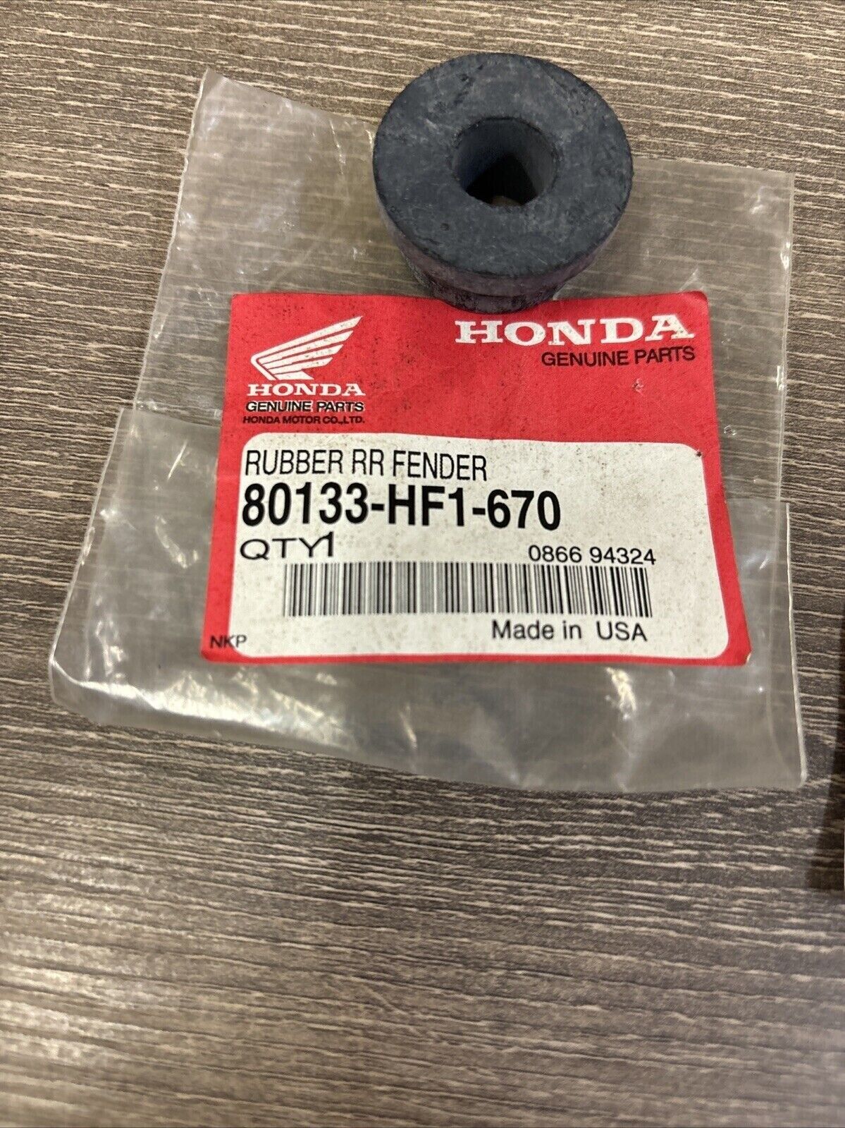 NOS Honda TRX200 TRX200D REAR FENDER RUBBER 80133-HF1-670 H123