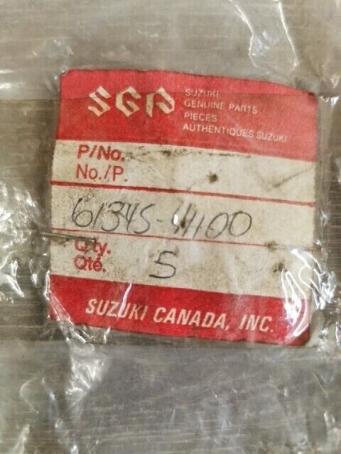 NOS SUZUKI RM60 RM400 RM250 RM100 ROLLER CHAIN TENSIONER 61345-41100 S38