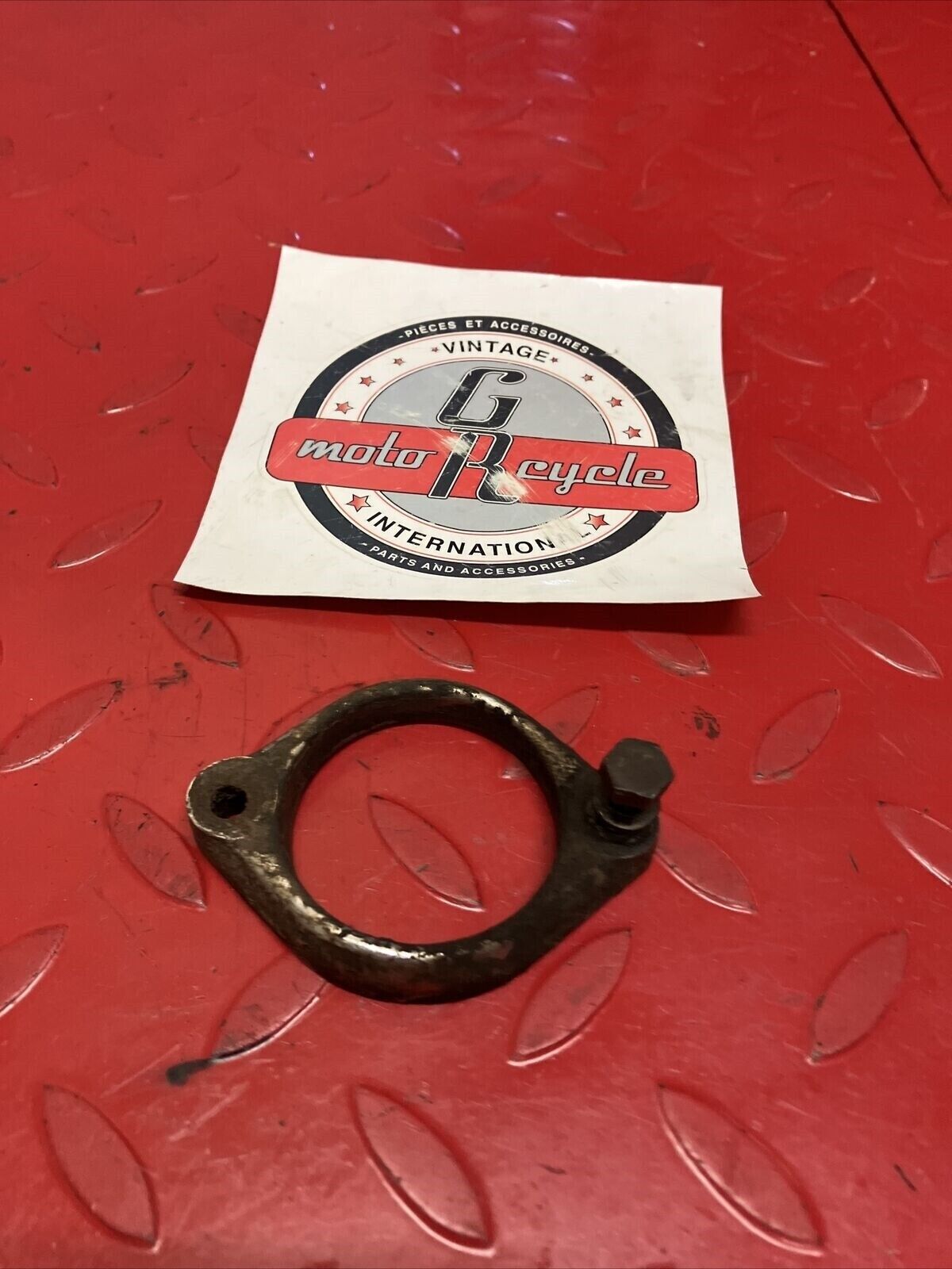 Suzuki TC125 1972 exhaust manifold clamp holder TS125 TC185 TS185
