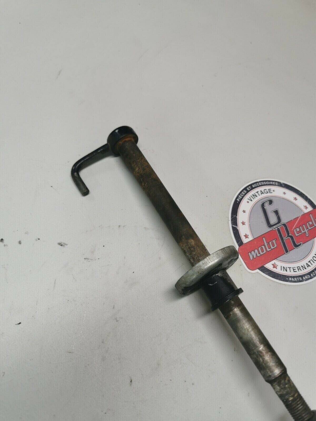 Suzuki PE175 1982 front wheel axle bolt 1983 1984