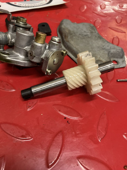 Suzuki DS100 1980 oil pump assembly gear cover shaft