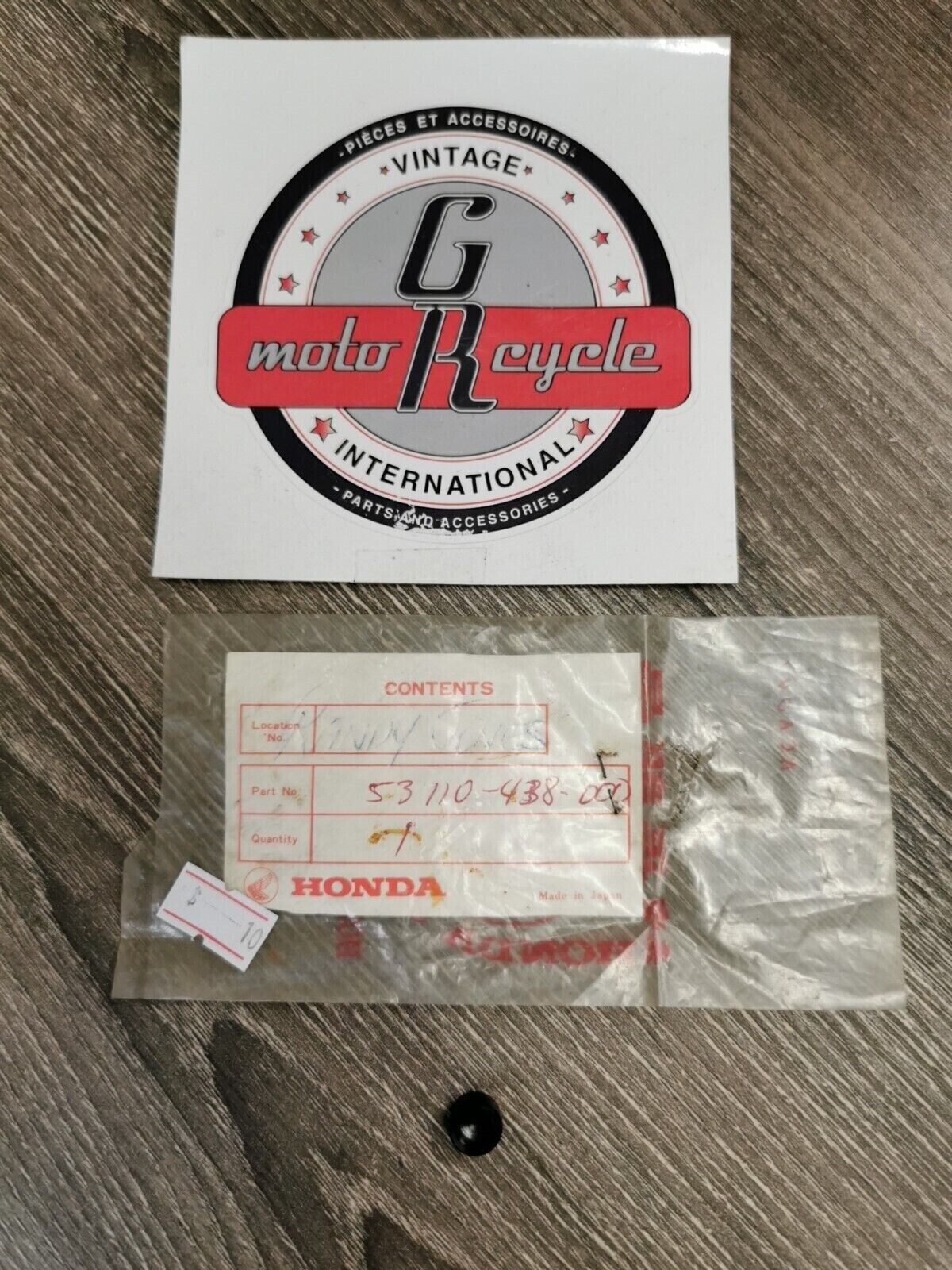NOS HONDA PLUG HANDL WEIGHT 53110-438-000 H54