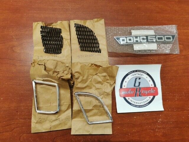 NOS Yamaha 1973 TX500 LEFT SIDE COVER NET, MOLD AND EMBLEM KIT Y128