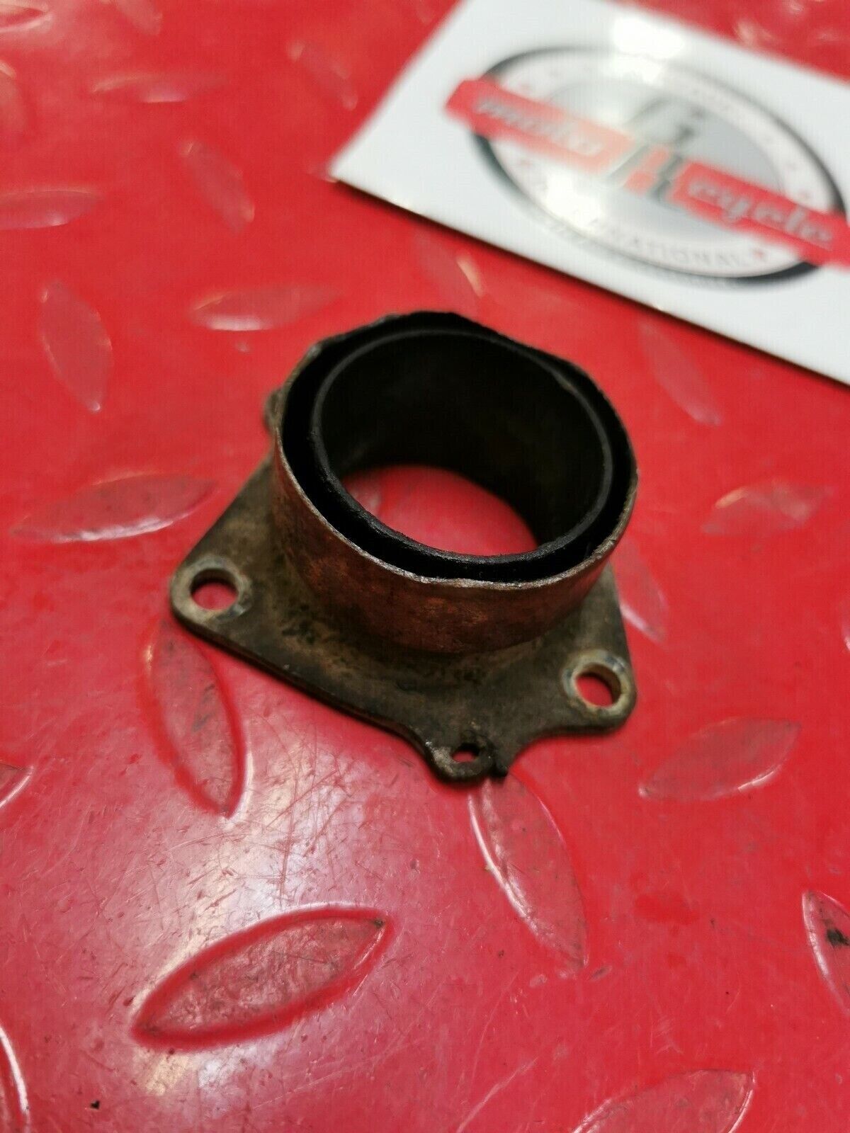 Suzuki RM125 1982 exhaust manifold pipe header flange holder 1981 1983