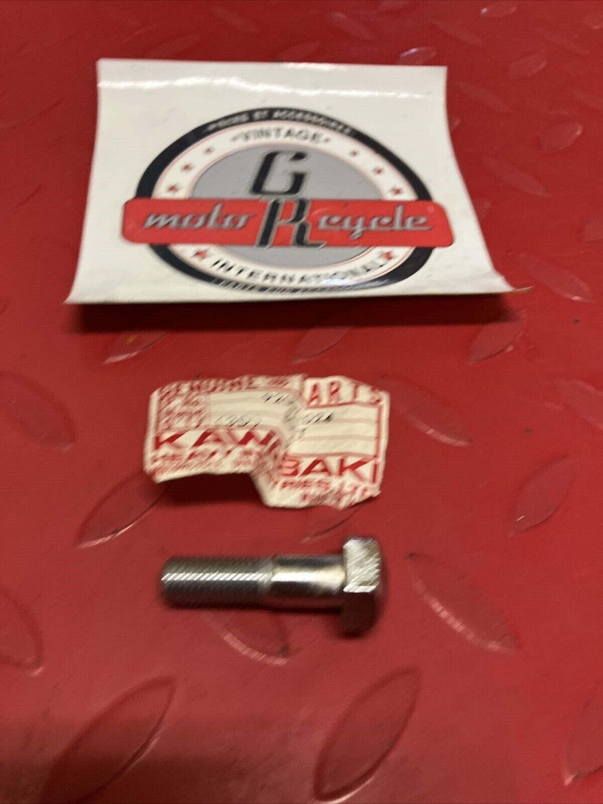 NOS KAWASAKI HEADLIGHT BOLT 10MM 92007-024 K18