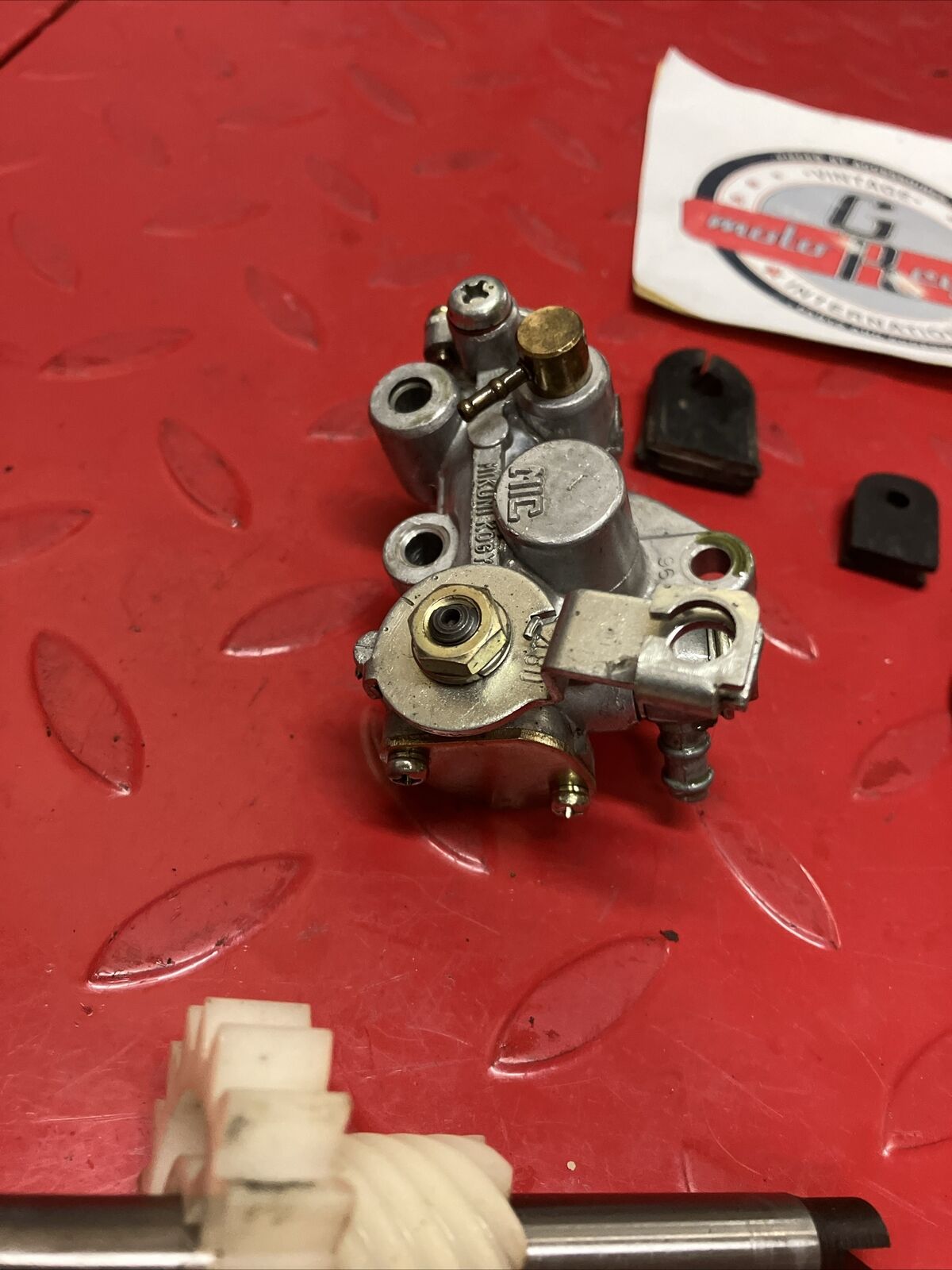 Suzuki DS100 1980 oil pump assembly gear cover shaft