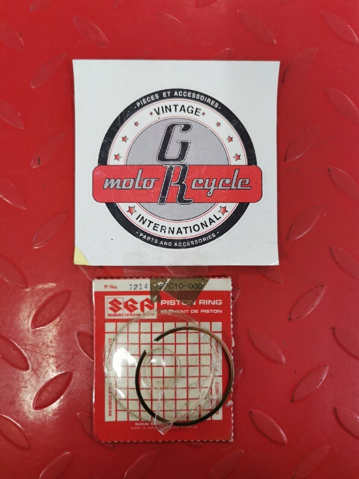 NOS SUZUKI RM125 1990 1991 PISTON RING 12141-27C10 S11