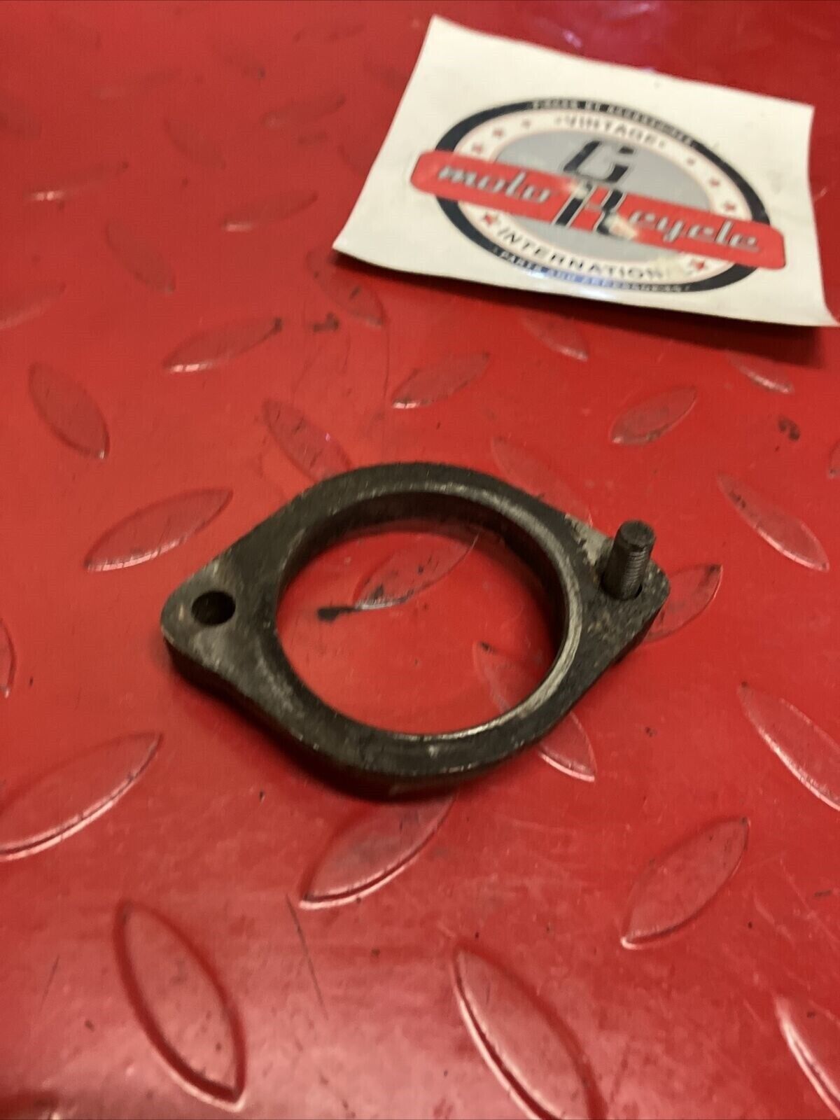 Suzuki TC125 1972 exhaust manifold clamp holder TS125 TC185 TS185