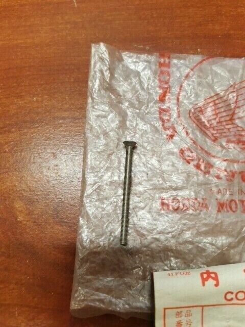NOS Honda CL70 CT70 SL70 XL70 XL75 XL80S HEADLIGHT SCREW 33102-041-670 H90