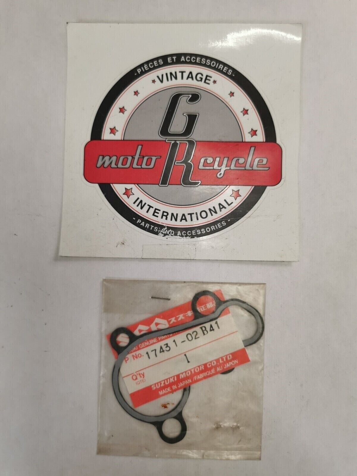 NOS SUZUKI RM80 RM60 1980 - 1983 EXHAUST GASKET 14181-46001-H17 S26