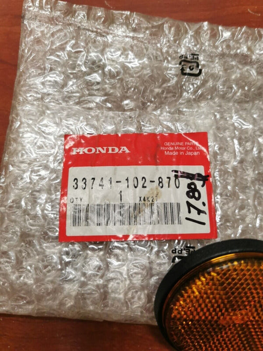 NOS Honda CMX250C CMX250X NH80 NQ50 FRONT REFLEX REFLECTOR 33741-102-870 H64