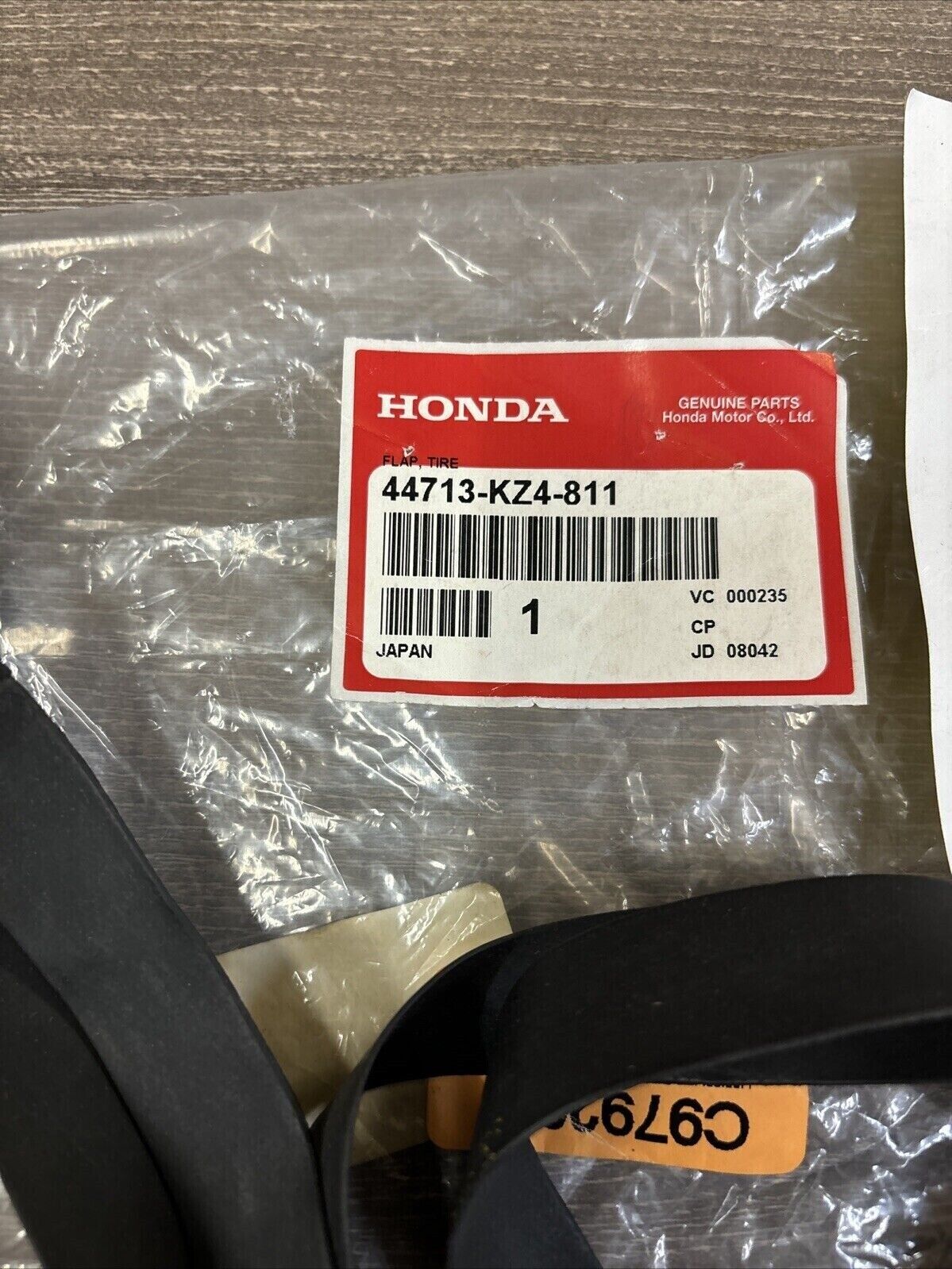 NOS Honda CR125R CR250R CRF250R CRF450R TIRE FLAP (DUNLOP) 44713-KZ4-811 H122