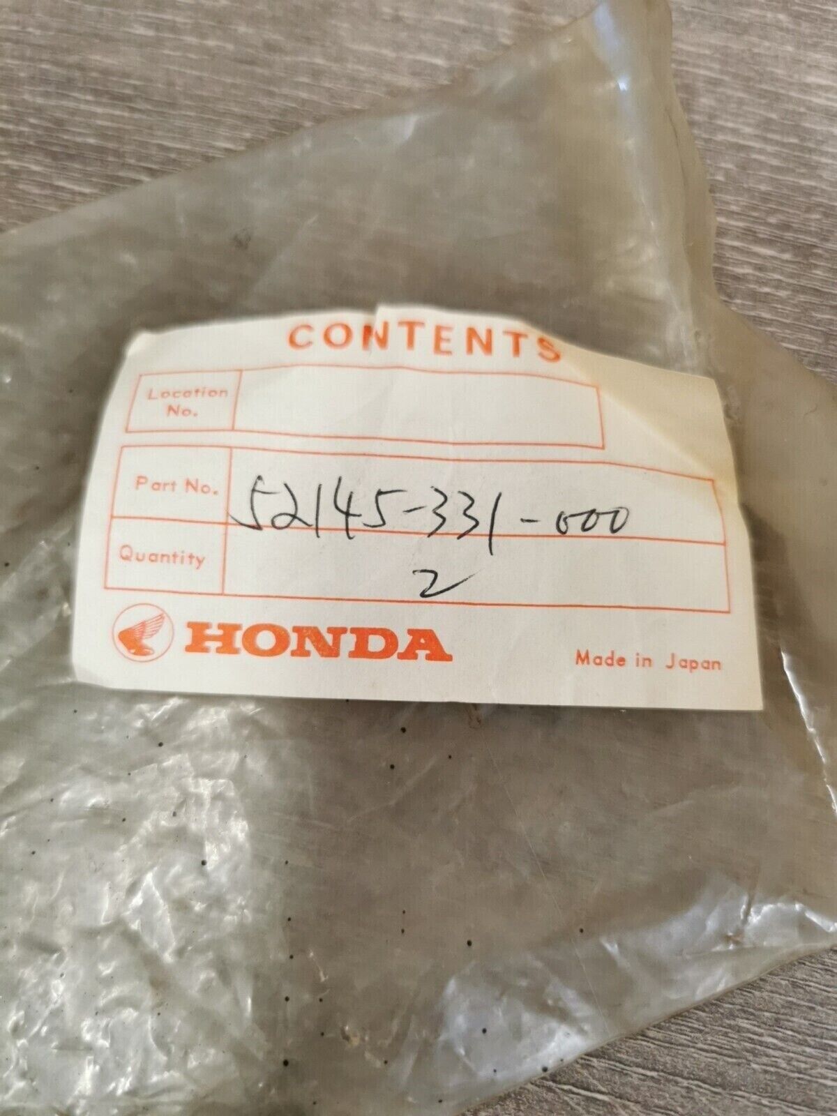 NOS HONDA SL100 1973 XL100 COLLAR RR SWINGARM PIVOT BOLT 52145-331-000 H48
