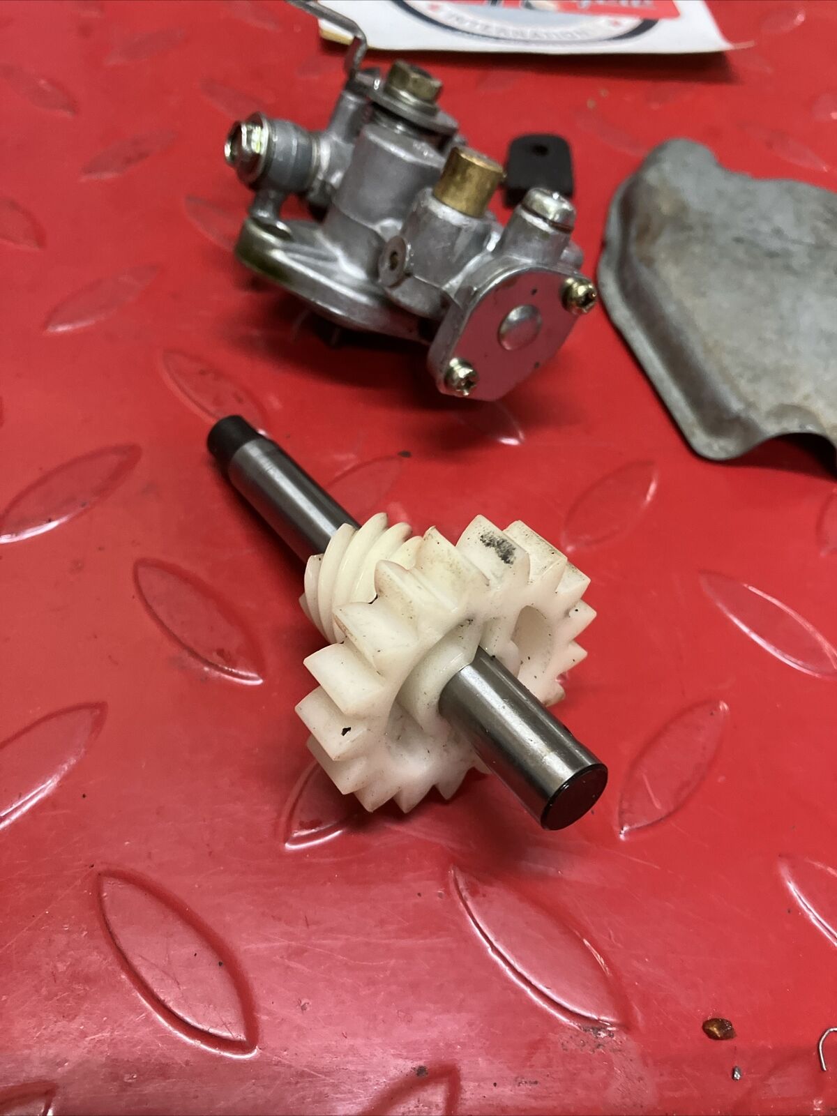 Suzuki DS100 1980 oil pump assembly gear cover shaft