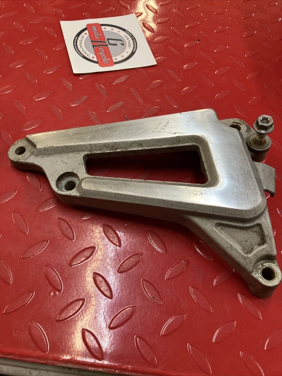 Yamaha XV500 Virago 500 left muffler silencer bracket footpeg holder mount