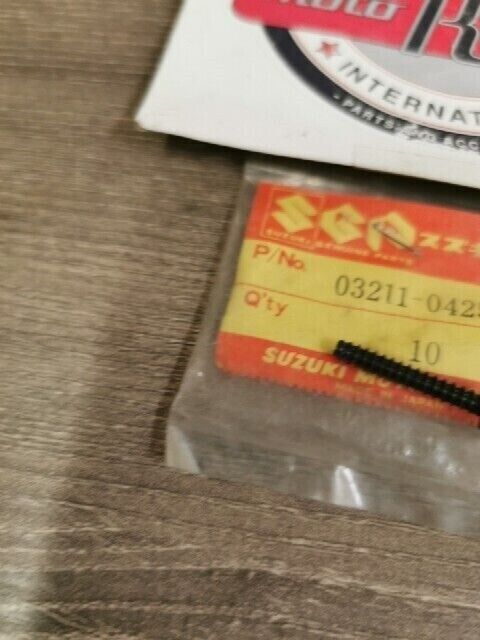 NOS SUZUKI RM60 TS75 GT500 TC100 GS400X GT500 TM75 SCREW 03211-04255 S47