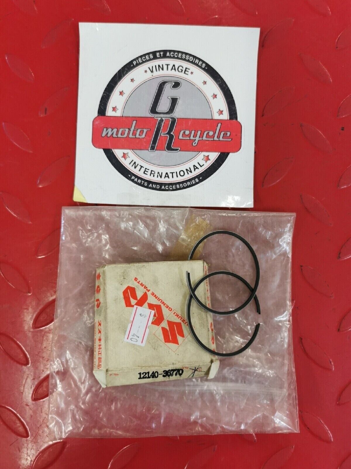 NOS SUZUKI RING SET PISTON OS 0.5 12140-36770 SUPERSEDED BY 12140-46000-050 S11