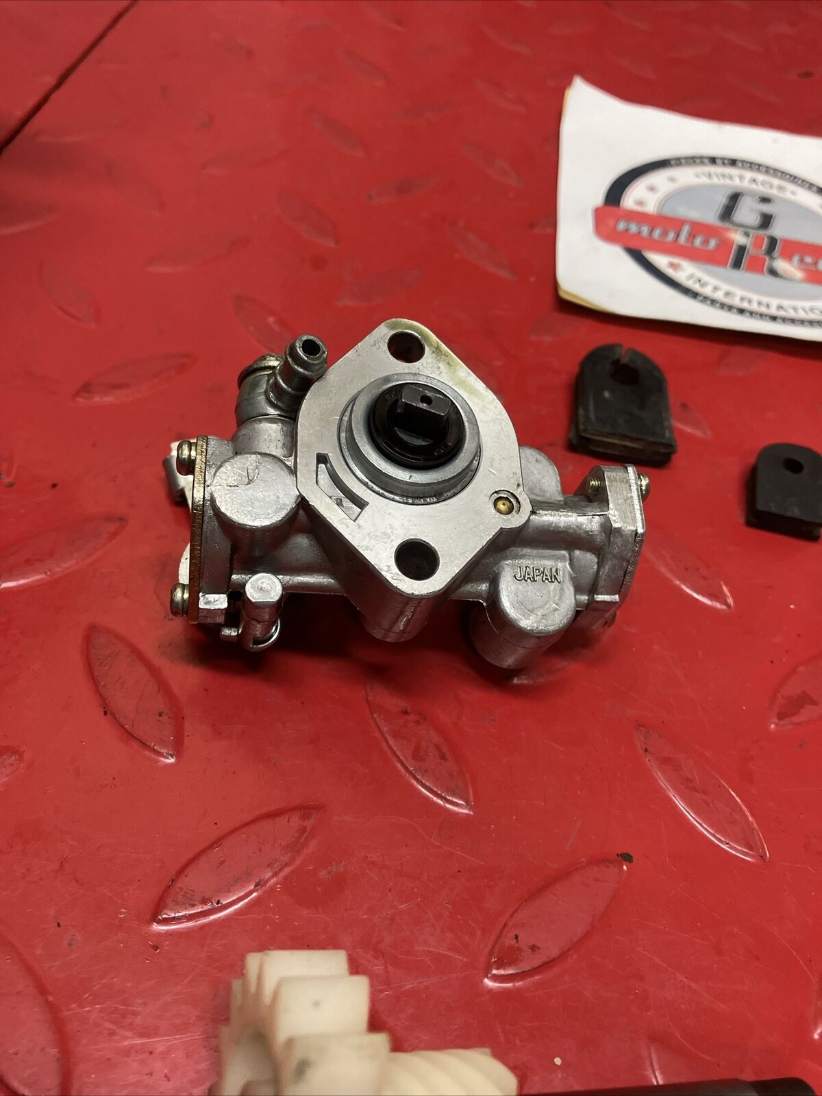 Suzuki DS100 1980 oil pump assembly gear cover shaft