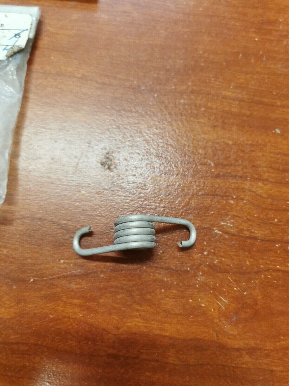 NOS KTM FOOTREST SPRING R/S & L/S 54603041000 KT3