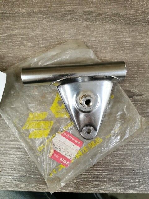 NOS SUZUKI TC125 1973 - 1977 TC185 BRACKET HEADLAMP HOUSING 51530-29621 S55