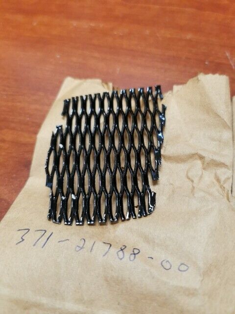 NOS Yamaha 1973 TX500 LEFT SIDE COVER NET, MOLD AND EMBLEM KIT Y128