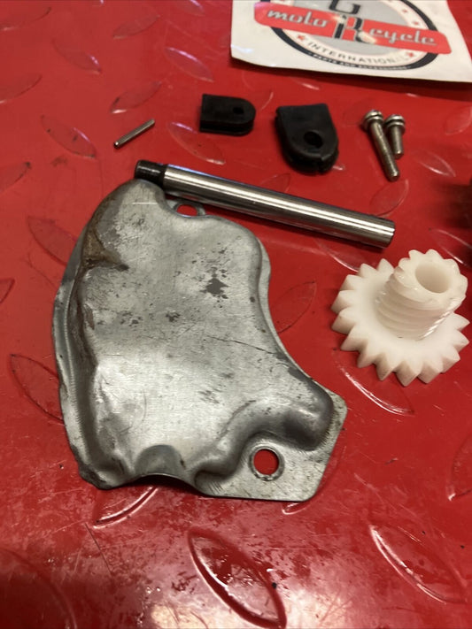 Suzuki DS100 1978 oil pump assembly gear cover shaft