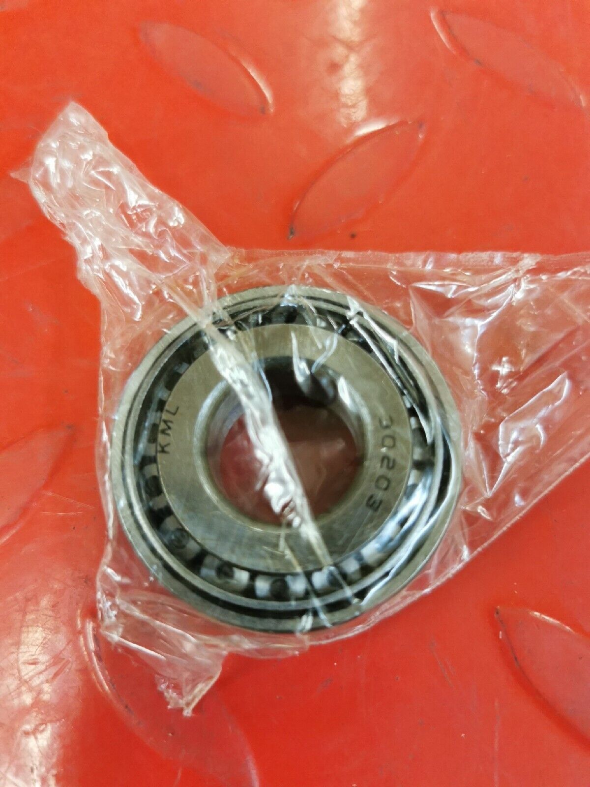 NOS KML TAPER ROLLER BEARINGS 30203 J11