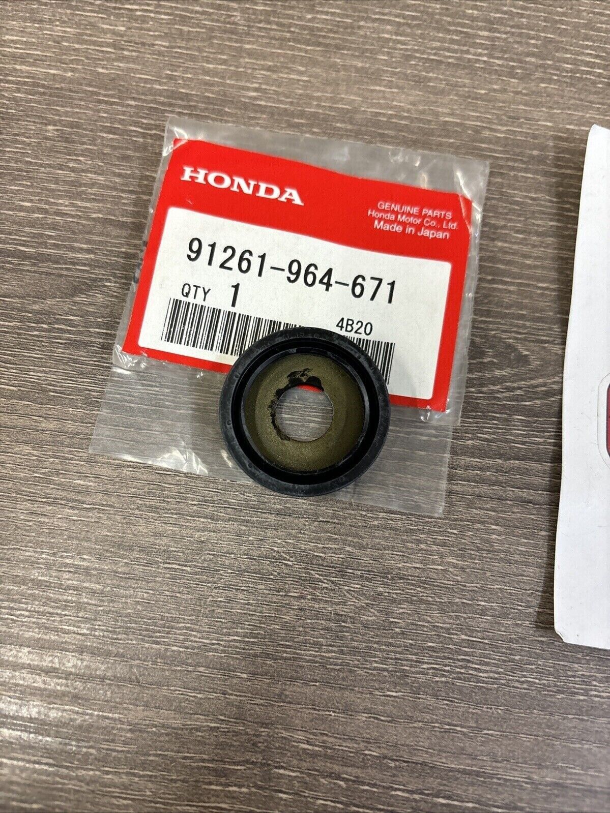 NOS Honda CR125R CR250R NX125 XR200R CUSHION ARM PIVOT SEAL 91261-964-671 H126