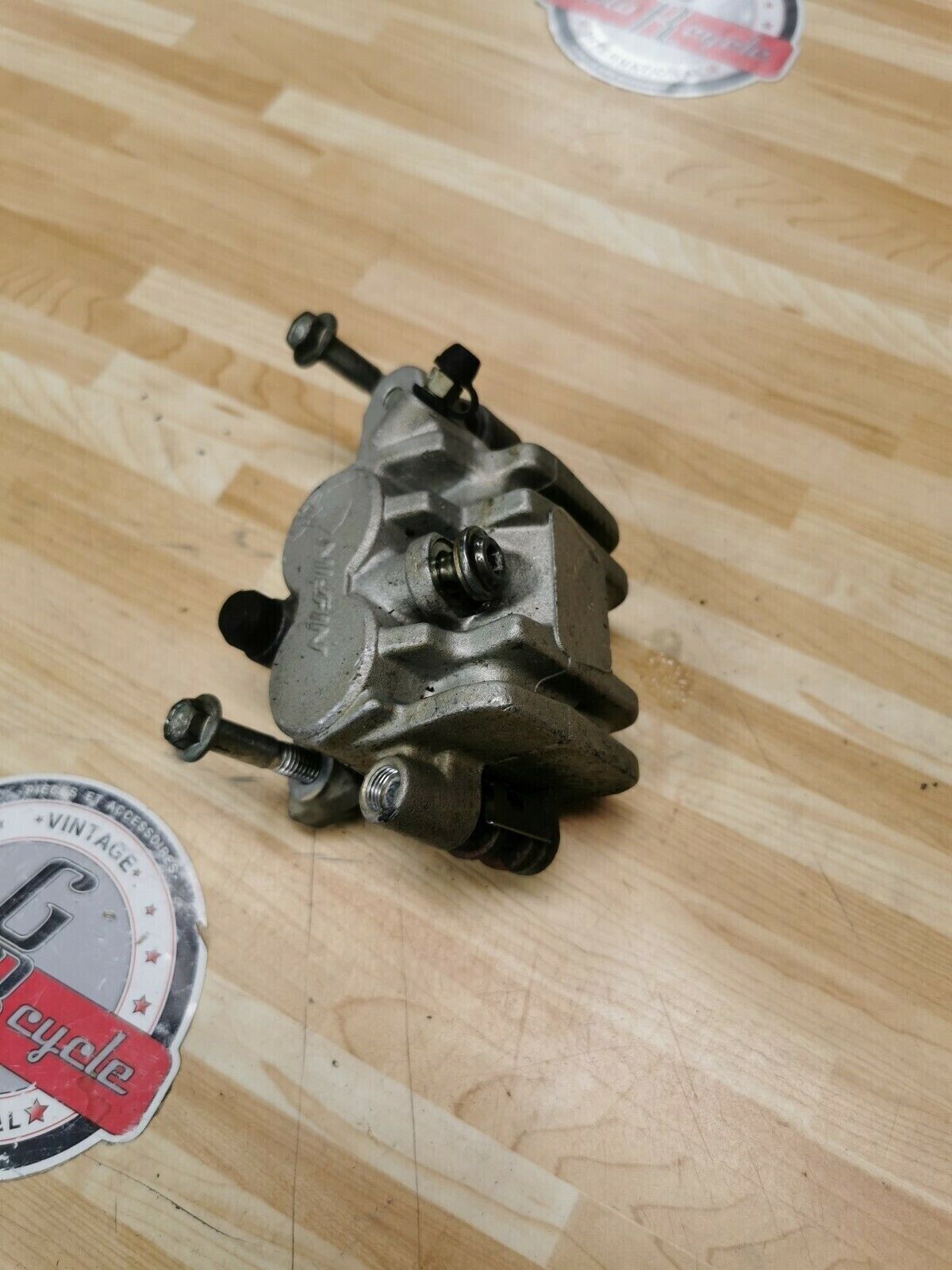 Suzuki RMZ450 2006 front brake caliper