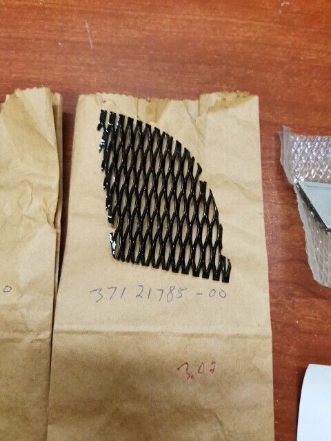 NOS Yamaha 1973 TX500 LEFT SIDE COVER NET, MOLD AND EMBLEM KIT Y128