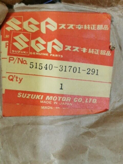 NOS SUZUKI GT550 1973 - 1977 BRACKET HEADLAMP LEFT 51540-31701-291 S55