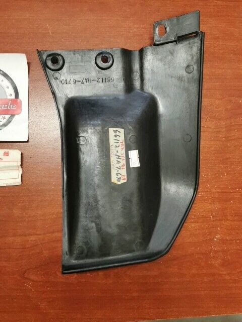 Honda 1986 - 1987 TRX350 LEFT FRONT FOOT SPLASH GUARD 66112-HA7-670 H73