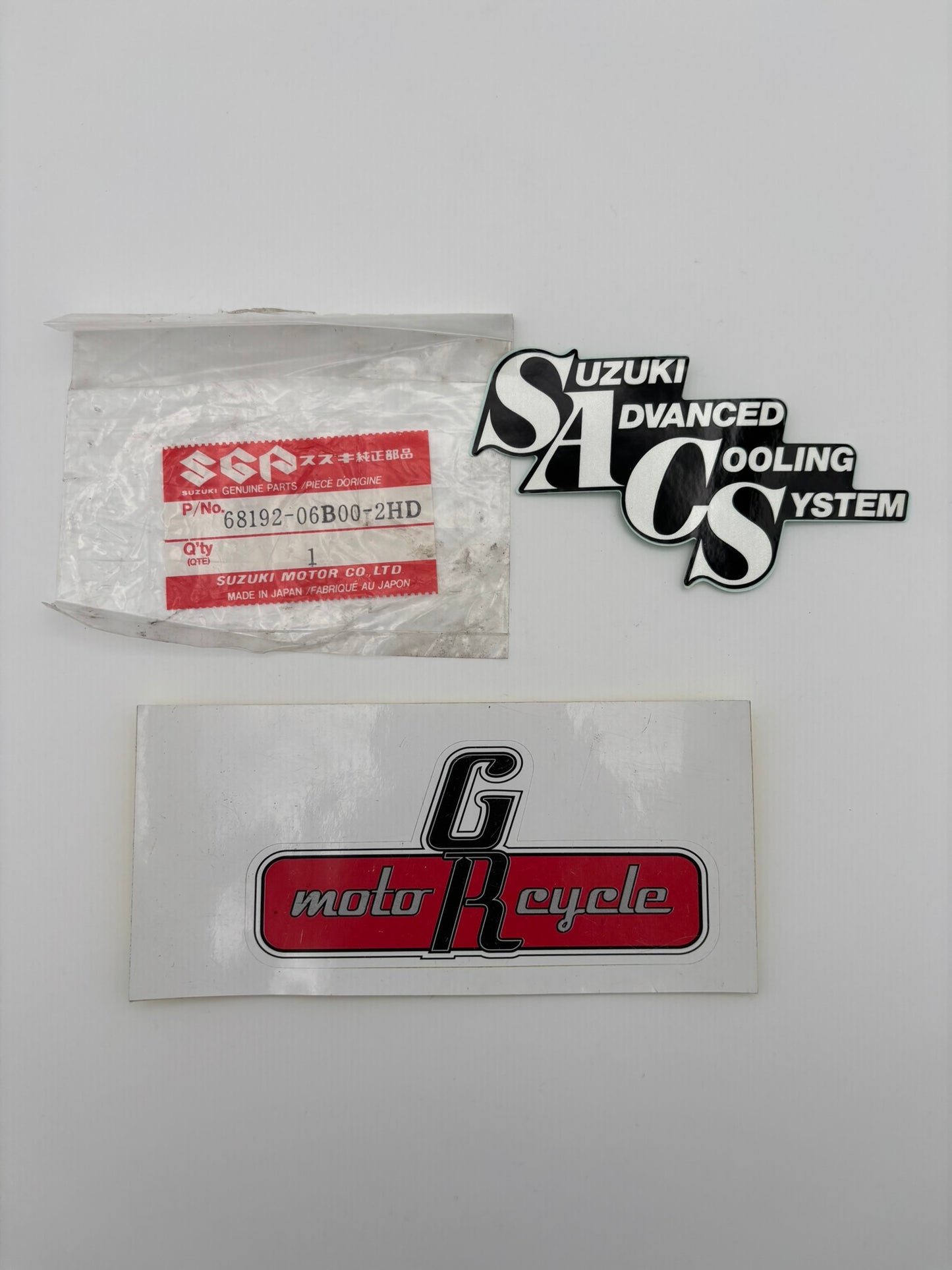SUZUKI UNDER COWLING EMBLEM 68192-06B00-2HD S67