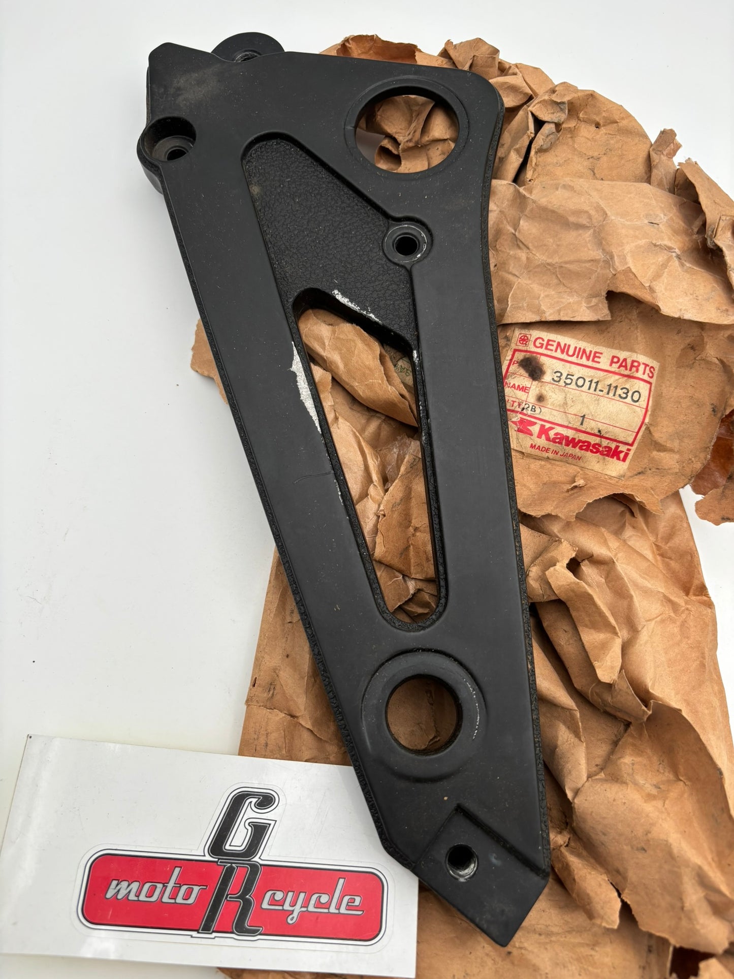 KAWASAKI USED LEFT HAND MUFFLER STAY 35011-1130-U K46