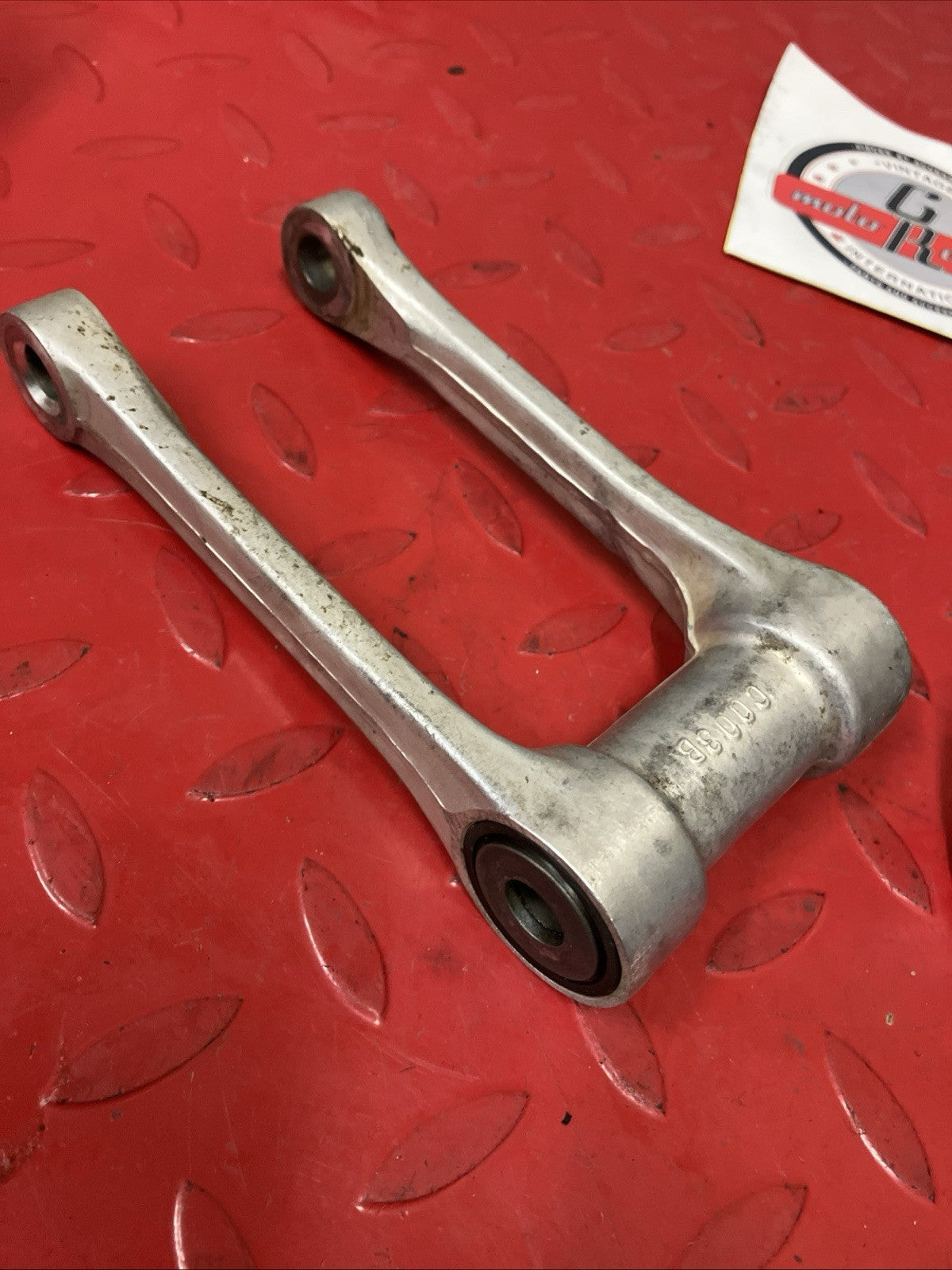 Honda CR250R 2000 Rear shock swingarm linkage dogbone connecting rod 2001