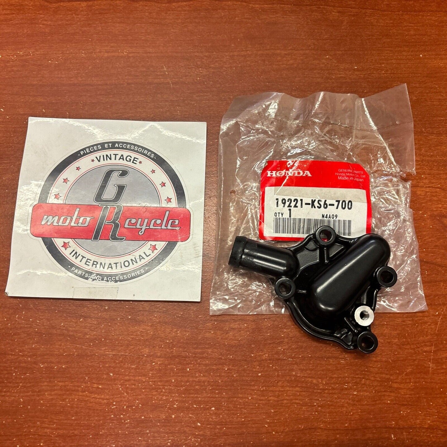 NOS Honda 1987 - 1994 CR125R WATER PUMP COVER 19221-KS6-700 H166