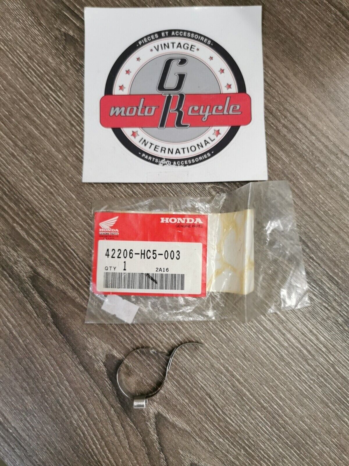 NOS HONDA TRX300FW BAND  42206-HC5-003 H54