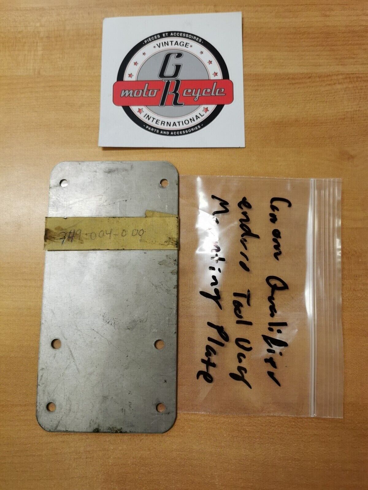 NOS Can-Am QUALIFIER ENDURO TOOL BAG MOUNTING PLATE 749-004-000 CA1