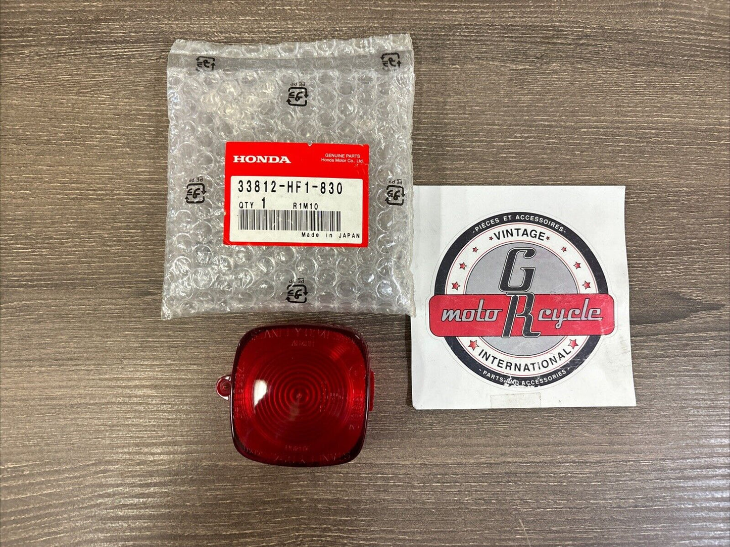 NOS Honda TRX200 TRX250 TRX300 TRX450 STOP LIGHT LENS 33812-HF1-830 H116