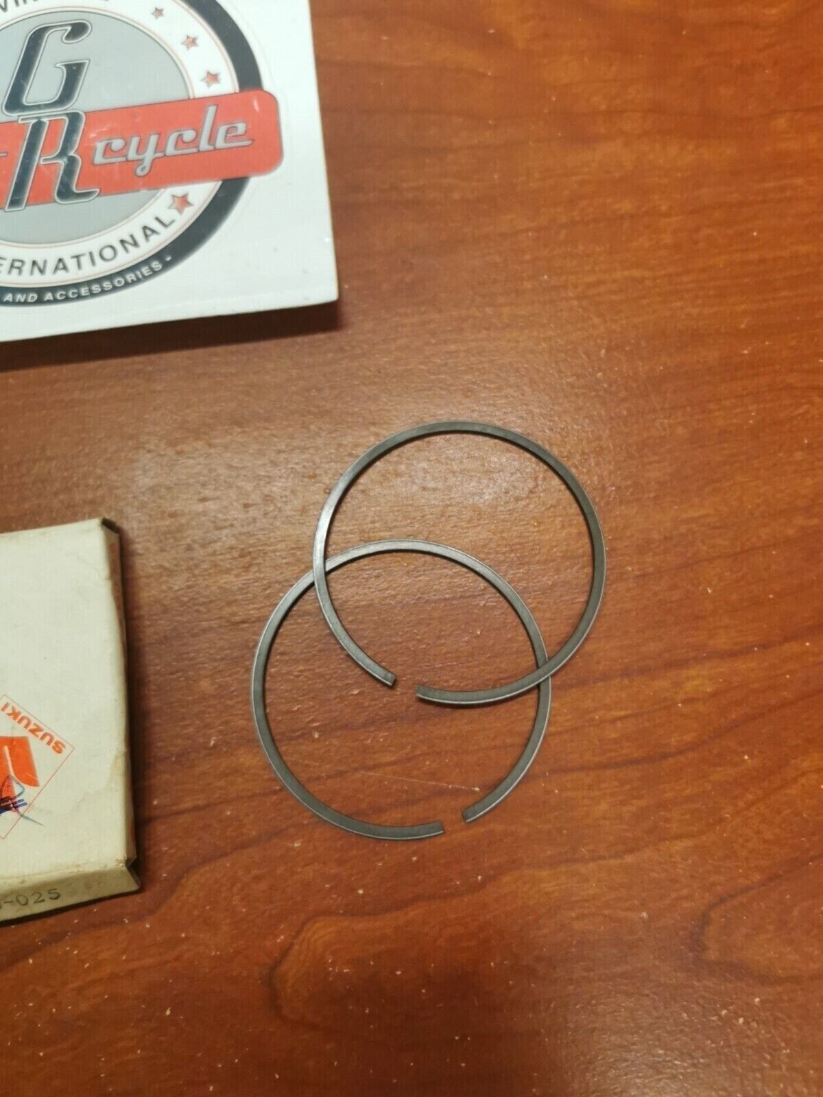 NOS Suzuki RM125B PISTON RING SET 0.25MM 12140-41660-025 S19
