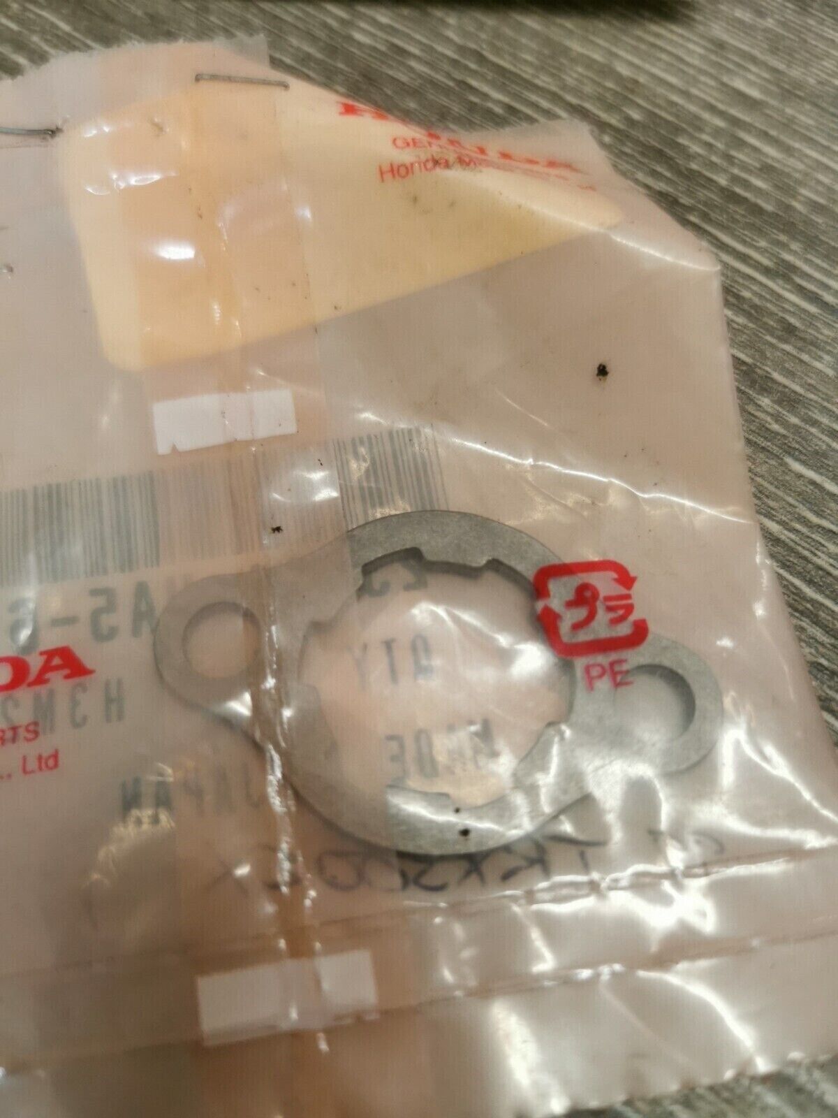 NOS HONDA FIXING PLATE 23811-HA5-670 H51