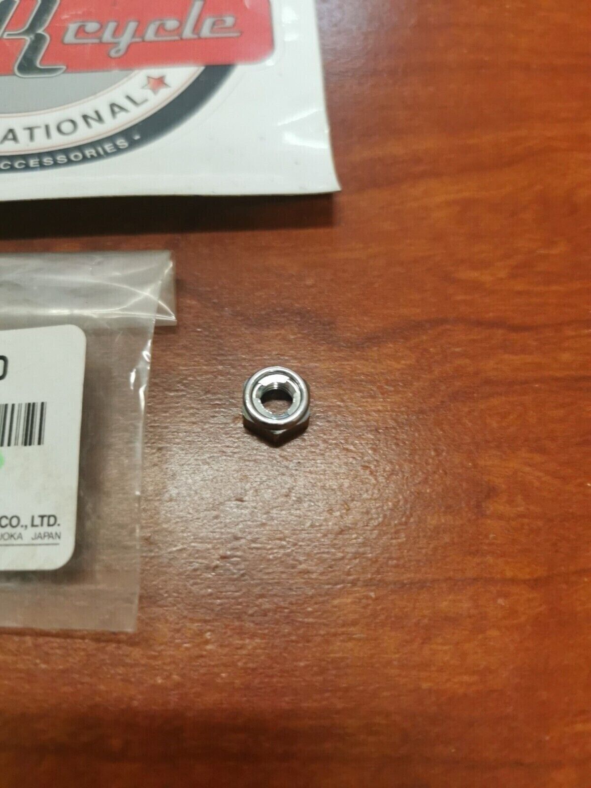 NOS Yamaha YZ450 YZ250 YZ125 YFS200 WR250 LENS FITTING NUT 5LP-84126-10-00 Y82