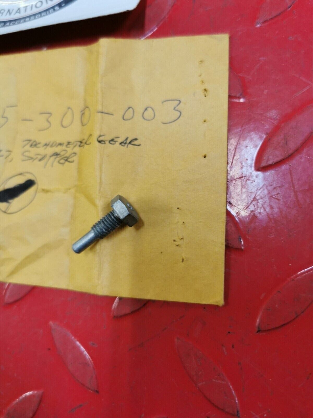 NOS Honda 1976 - 1978 CB750 BOLT, TACHOMETER GEAR STOPPER 12435-300-003 H32