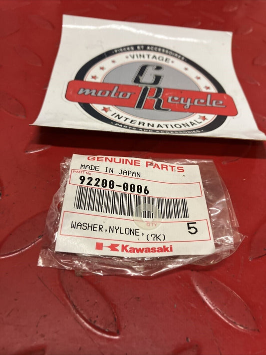 NOS KAWASAKI WASHER NYLONE 5.3x11.5x0.5 92200-0006 K13