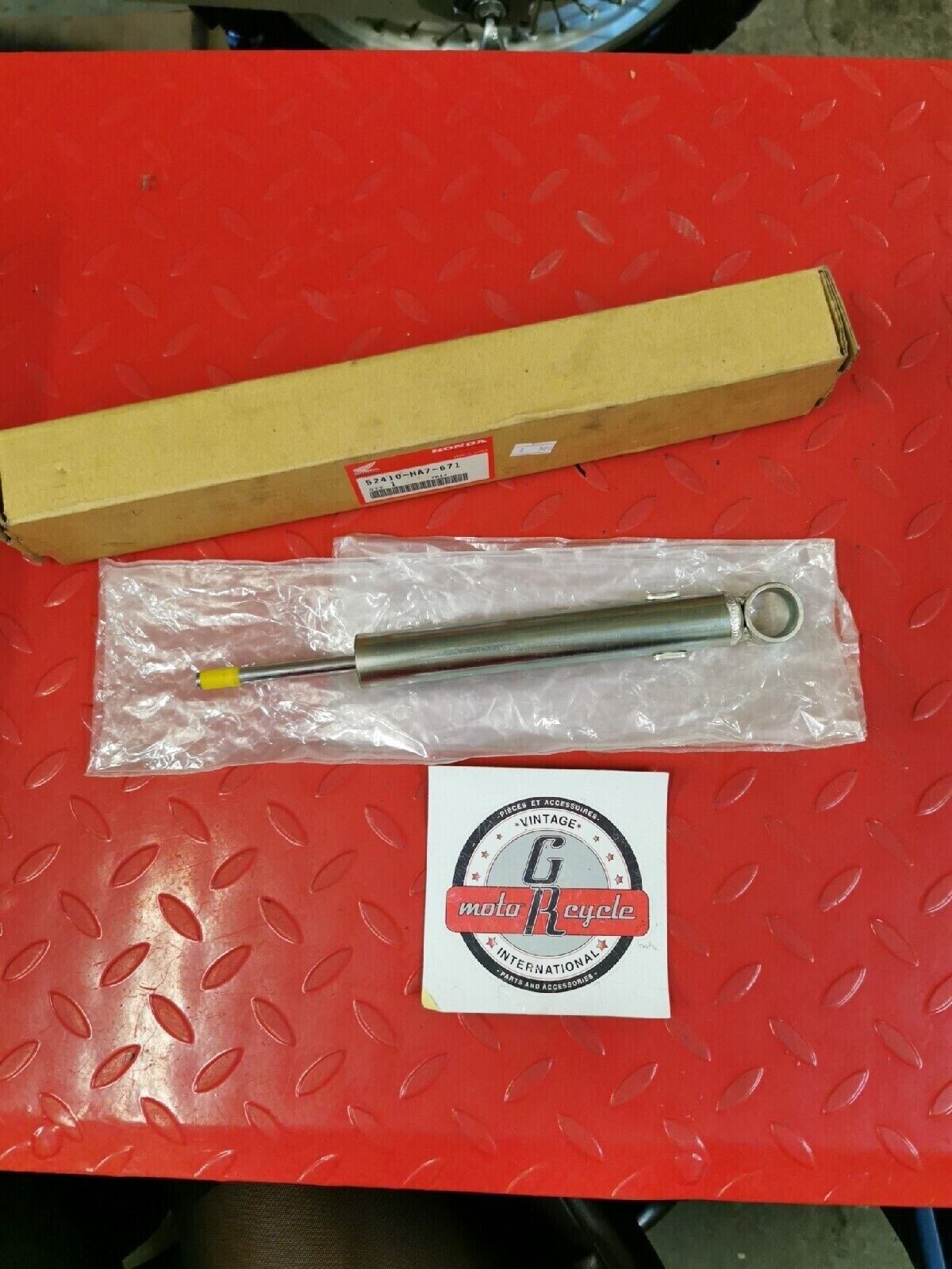 NOS HONDA TRX350 TRX350D 1986 - 1989 SHOCK ABSORBER  RR  52410-HA7-671  H39
